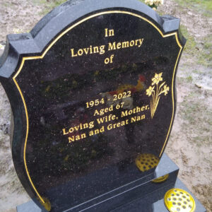 Gold pin line headstone